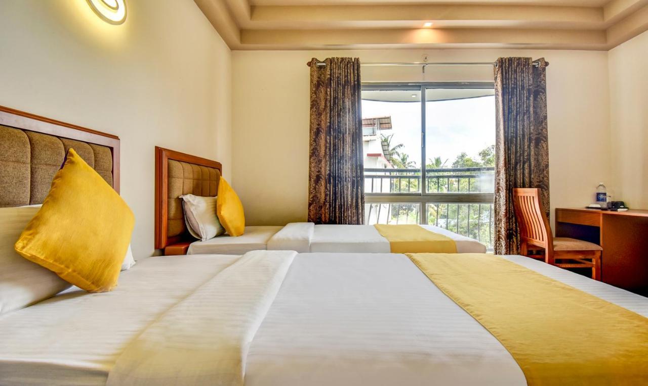 Hotel Garden Inn Коччи Экстерьер фото