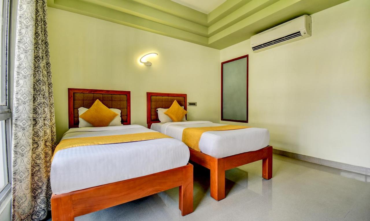 Hotel Garden Inn Коччи Экстерьер фото