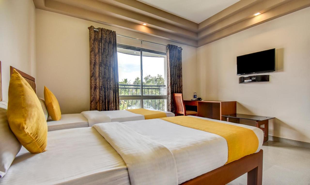 Hotel Garden Inn Коччи Экстерьер фото