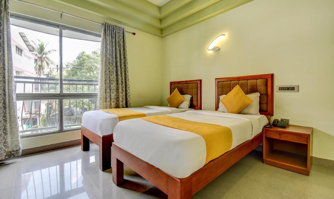 Hotel Garden Inn Коччи Экстерьер фото