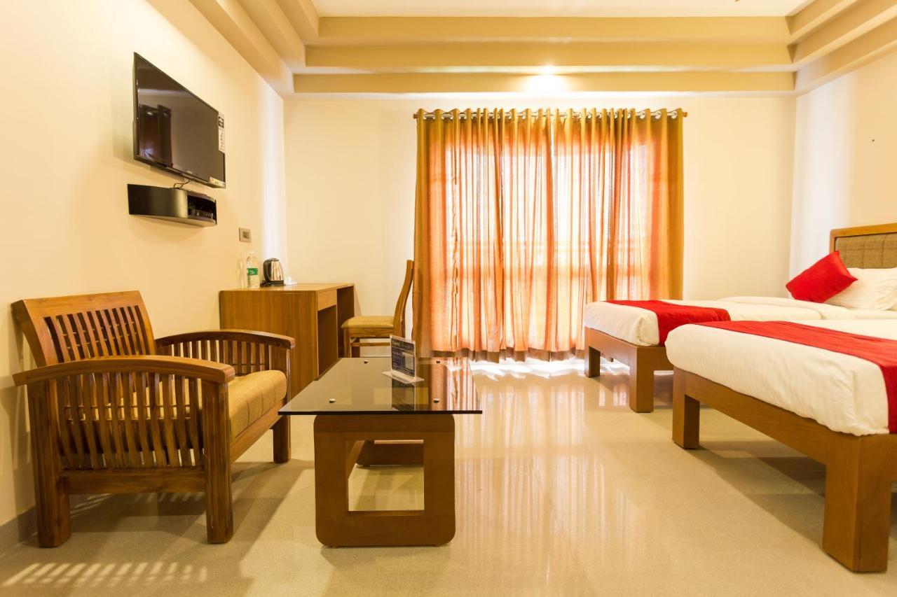 Hotel Garden Inn Коччи Экстерьер фото