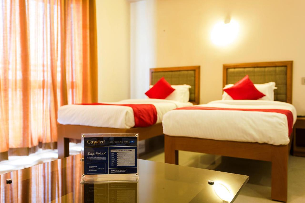 Hotel Garden Inn Коччи Экстерьер фото